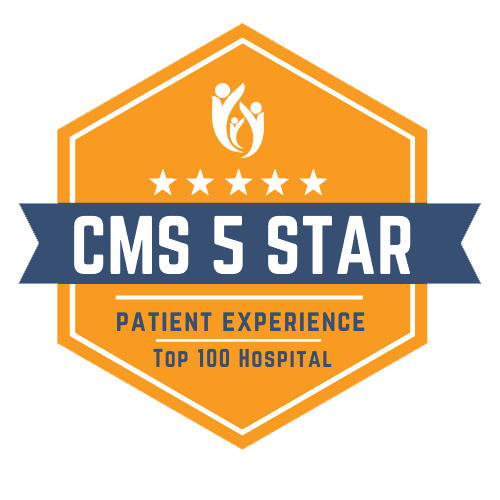 Orange badge with five stars, a family icon, and text: “CMS 5-Star Patient Experience Top 100 Hospital” on a blue ribbon across the badge, highlighting SCMC’s exceptional commitment to quality care.