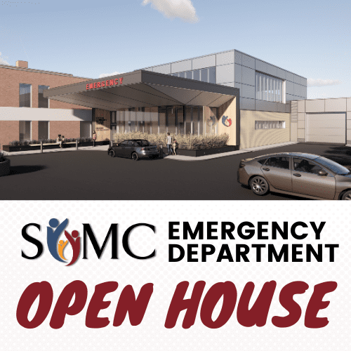 A modern hospital emergency department with cars parked outside. Text reads “SOMC Emergency Dept. Open House – Oct. 29.”.