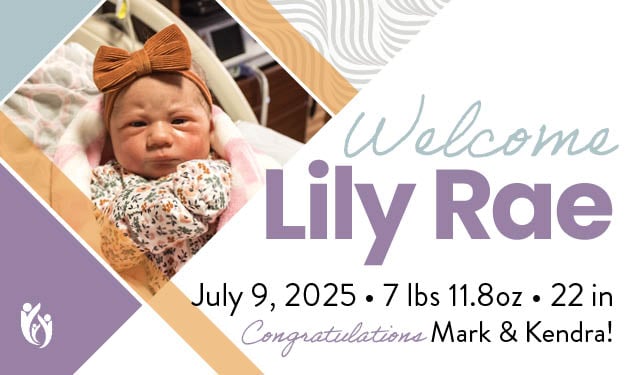 Newborn baby with a brown bow and floral outfit lying on a blanket. Text reads: “Welcome Lily Rae. July 9, 2025 • 7 lbs 11.8oz • 22 in. Congratulations Mark & Kendra!”.